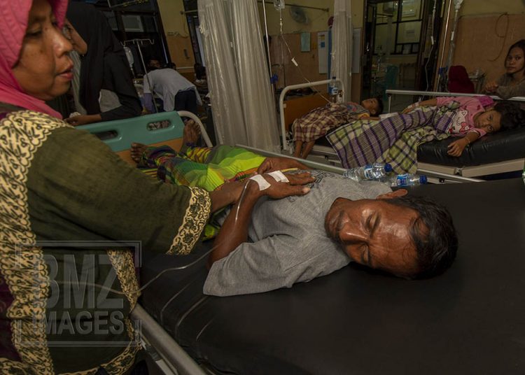 Refugees victims of the earthquake and tsunami received medical treatment due to food poisoning at Anutapura Hospital, Palu, Central Sulawesi, Indonesia, Saturday (January 19, 2019). At least 50 people displaced by the earthquake and tsunami that inhabited refugee camps were rushed to hospitals due to poisoning after eating food distributed by donors. Photo by bmzIMAGES/Basri Marzuki