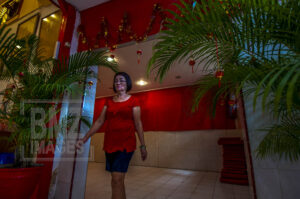 Palu, Central Sulawesi, Indonesia (February 5, 2019): A Chinese woman prepares equipment to pray for the Lunar New Year in Magabudhi Temple in Palu, Central Sulawesi, Indonesia, Tuesday, February 5, 2019. Citizens of Chinese descent believe the Lunar New Year to 2570 is the year of the pig. The Lunar New Year worship tradition this time took place solemnly because it was still tinged with a post-disaster grief on September 28, 2018 which killed thousands of people. (Photo by Basri Marzuki/bmzIMAGES)