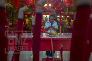 Palu, Central Sulawesi, Indonesia (February 5, 2019) : A Chinese citizen prays for the Lunar New Year in Magabudhi Temple in Palu, Central Sulawesi, Indonesia, Tuesday, February 5, 2019. Citizens of Chinese descent believe the Lunar New Year to 2570 is the year of the pig. The Lunar New Year worship tradition this time took place solemnly because it was still tinged with a post-disaster grief on September 28, 2018 which killed thousands of people. (Photo by Basri Marzuki/bmzIMAGES)