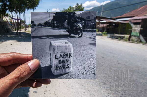 Jalan poros Palu-Bangga, Kecamatan Marawola, Kabupaten Sigi, Sulawesi Tengah, Kamis (26/9/2019). Aktivitas masyaraka di wilayah itu kembali berjalan normal. bmzIMAGES/Basri Marzuki