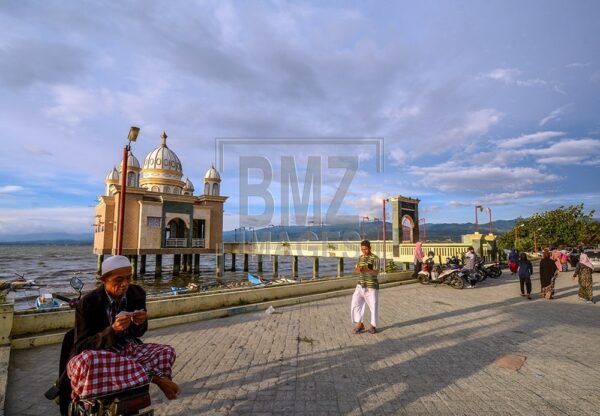 Palu, Central Sulawesi, Indonesia (7 Feberuari 2019) - Photo of Arqam Baburrahman Mosque or Palu Floating Mosque taken on May 18, 2018 before the tsunami struck it on Kampung Lere Beach, Palu Bay, Central Sulawesi, Indonesia. The tsunami that hit the coastal area on September 28, 2018 also hit the mosque which was once one of the tourist icons in Palu City. The 121 square meter mosque did not collapse, but because the tsunami preceded by the earthquake resulted in a decline in land on the beach up to 1.5 meters and also sank some of the mosque's buildings. The bridge to the mosque that was built in 2011 was broken and shifted up to tens of meters, but could no longer be used. Many residents came to this place after the tsunami to see first hand the conditions and take photos. Although local residents intended to repair the mosque, the local government banned because the mosque was in the red zone of the tsunami disaster, which meant no construction could be done on it. (bmzIMAGES/Basri Marzuki)