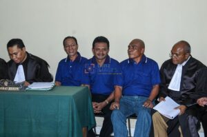 Three Poso riot defendants, Fabianus Tibo (second left), Marunis Ruwu (center), and Dominggus da Silva (second right) attend a judicial review hearing at the Petobo Penitentiary in Palu, Central Sulawesi, Indonesia, March 9, 2006. All three were executed after the local District Court convicted them of premeditated murder during the 1998-2005 period of unrest. (bmzIMAGES/Basri Marzuki)